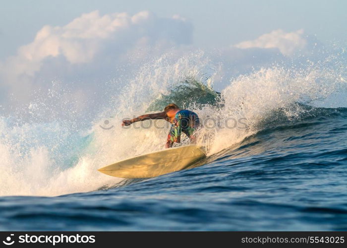 Picture of Surfing a Wave.Sumbawa Island. Indonesia.