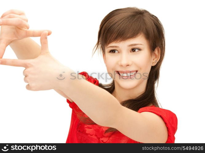 picture of teenage girl creating a frame with fingers