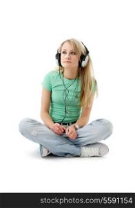 picture of teenage girl in headphones sitting on the floor