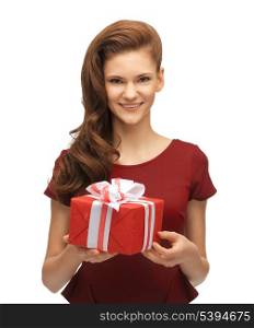 picture of teenage girl in red dress with gift box