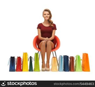 picture of teenage girl in red dress with shopping bags