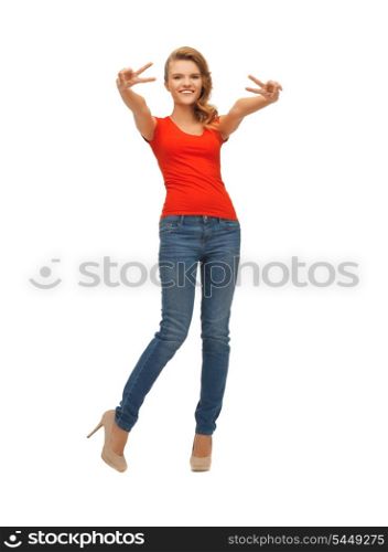 picture of teenage girl in red t-shirt showing victory sign