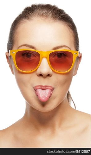 picture of teenage girl in shades sticking out her tongue