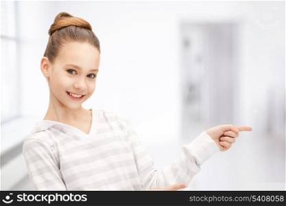picture of teenage girl pointing her finger
