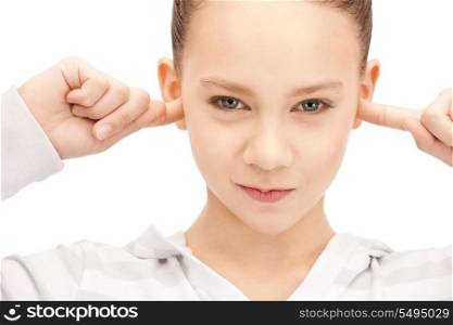 picture of teenage girl with fingers in ears