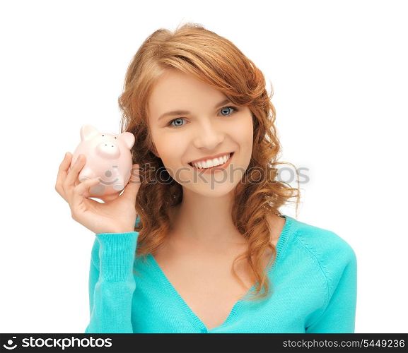 picture of teenage girl with piggy bank