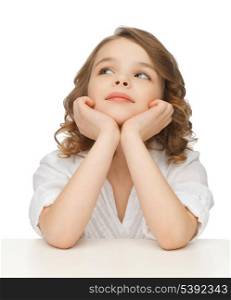 picture of thinking pre-teen girl in casual clothes
