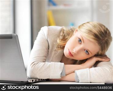 picture of tired woman with laptop computer
