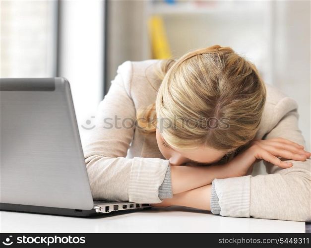 picture of tired woman with laptop computer