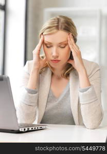 picture of tired woman with laptop computer