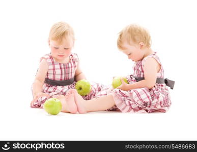 picture of two adorable twins over white