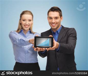 picture of two business people showing tablet pc with graph