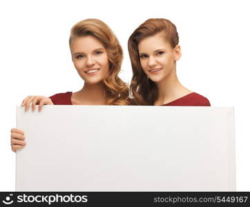 picture of two teenage girls in red dresses with blank board