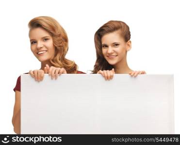 picture of two teenage girls in red dresses with blank board