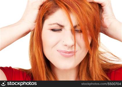 picture of unhappy redhead woman over white