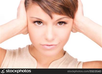 picture of unhappy woman with hands on ears