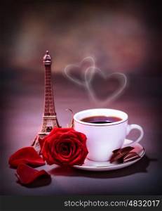 Picture of white cup with coffee and chocolate decorated with red rose on the table in Paris, romantic honeymoon, celebration anniversary in France, Valentine day holiday, love and romance concept