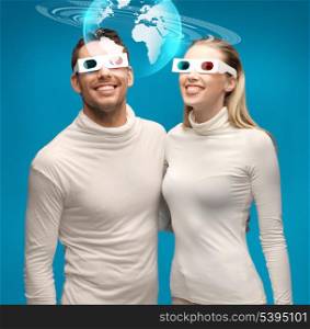 picture of woman and man in 3d glasses looking at globe model