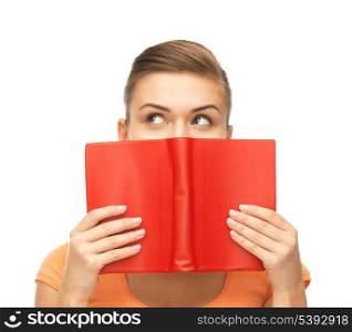 picture of woman eyes and hands holding red book