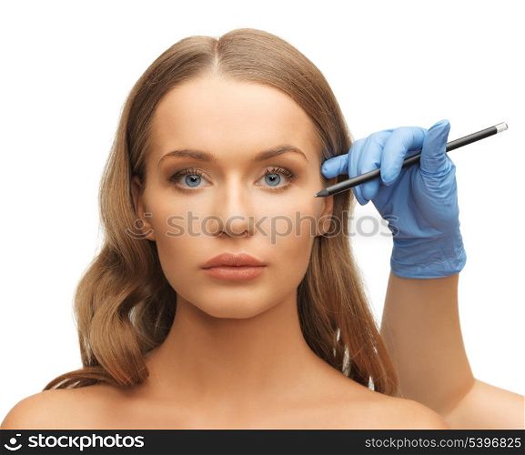 picture of woman face and beautician hands with pencil