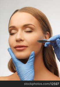 picture of woman face and beautician hands with scalpel