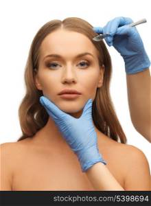 picture of woman face and beautician hands with scalpel