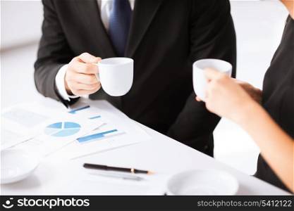 picture of woman hand signing contract paper