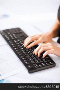 picture of woman hands typing on keyboard