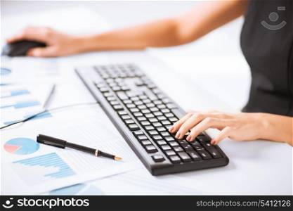 picture of woman hands typing on keyboard