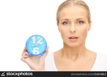 picture of woman holding alarm clock over white