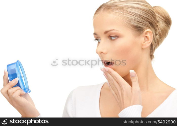 picture of woman holding alarm clock over white