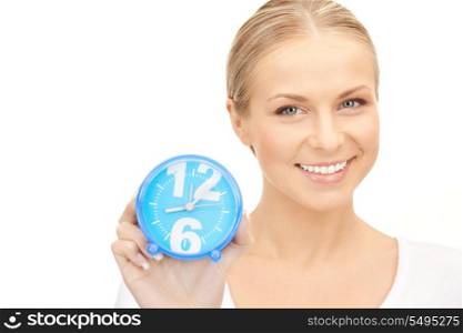 picture of woman holding alarm clock over white