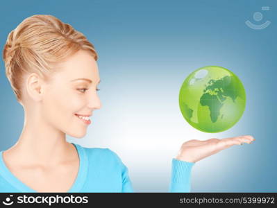 picture of woman holding green globe on her hand