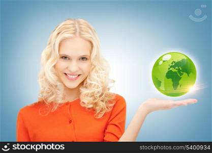 picture of woman holding green globe on her hand