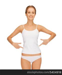 picture of woman in blank shirt pointing at her belly
