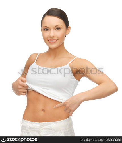 picture of woman in blank shirt showing her belly