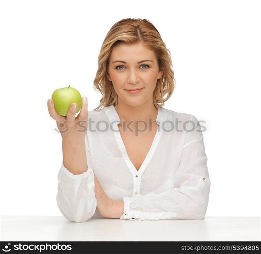 picture of woman in casual clothes with green apple