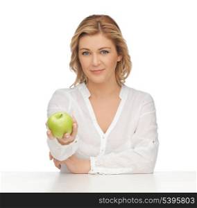 picture of woman in casual clothes with green apple