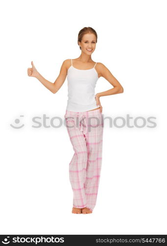 picture of woman in cotton pajamas showing thumbs up