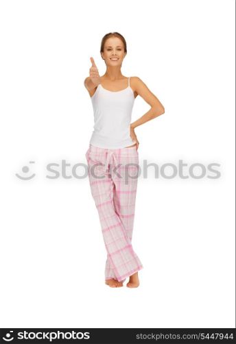 picture of woman in cotton pajamas showing thumbs up