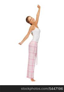 picture of woman in pajamas doing morning exercise