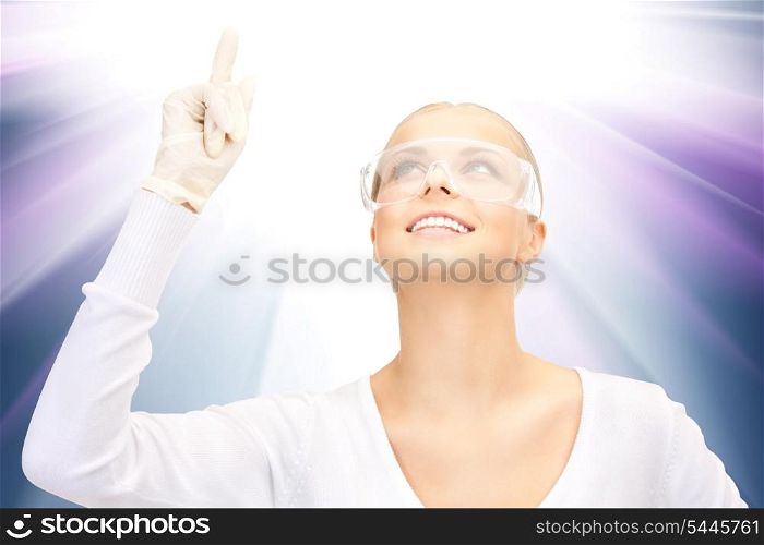 picture of woman in protective glasses and gloves