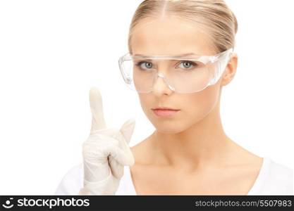 picture of woman in protective glasses and gloves
