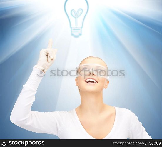 picture of woman in protective glasses and gloves showing idea concept