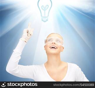 picture of woman in protective glasses and gloves showing idea concept