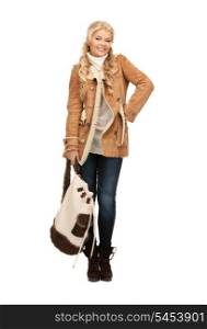 picture of woman in sheepskin jacket with backpack