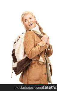 picture of woman in sheepskin jacket with backpack