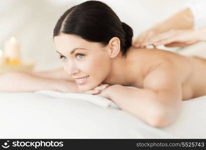 picture of woman in spa salon getting massage