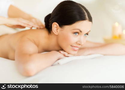 picture of woman in spa salon getting massage. woman in spa