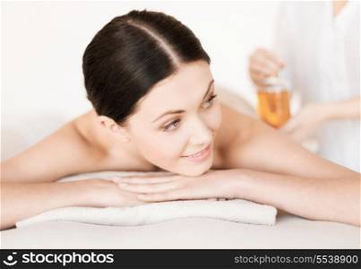 picture of woman in spa salon getting oil treatment